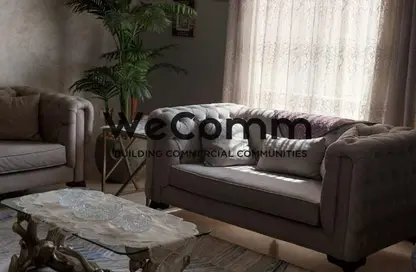Apartment - 2 Bedrooms - 2 Bathrooms for sale in Palm Hills Village Gate - South Investors Area - New Cairo City - Cairo