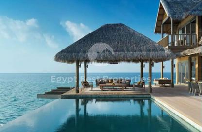 Chalet - 2 Bedrooms - 3 Bathrooms for sale in Makadi Orascom Resort - Makadi - Hurghada - Red Sea