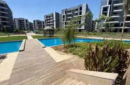 Apartment - 2 Bedrooms - 2 Bathrooms for sale in Sun Capital - Fayoum Desert road - 6 October City - Giza