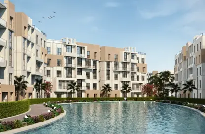 Apartment - 2 Bedrooms - 2 Bathrooms for sale in Al Wahat Road - 6 October City - Giza