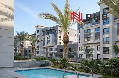 Apartment - 2 Bedrooms - 2 Bathrooms for sale in Trio Gardens - 5th Settlement Compounds - The 5th Settlement - New Cairo City - Cairo
