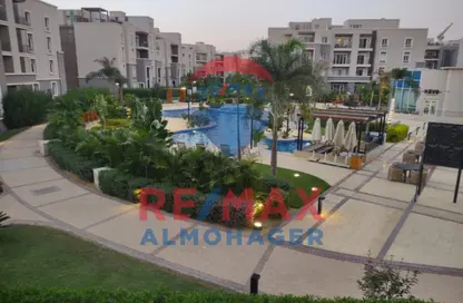 Apartment - 3 Bedrooms - 3 Bathrooms for sale in October Plaza - 6 October Compounds - 6 October City - Giza