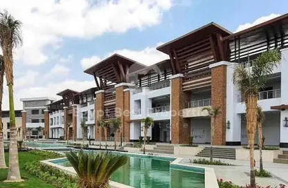 Townhouse - 3 Bedrooms - 4 Bathrooms for sale in VAHA by Alkarma Developments - New Zayed City - Sheikh Zayed City - Giza