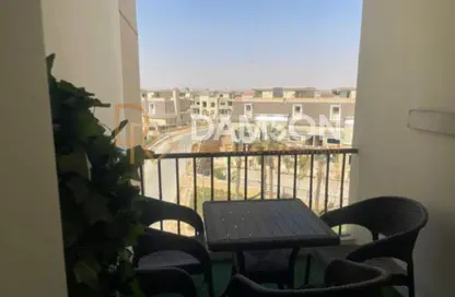 Apartment - 2 Bedrooms - 2 Bathrooms for sale in Suez Road - New Cairo City - Cairo