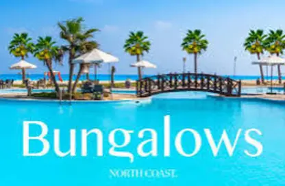 Twin House - 4 Bedrooms - 4 Bathrooms for sale in Bungalows North Coast - Bungalows - Markaz Al Hamam - North Coast