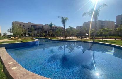 Apartment - 2 Bedrooms - 3 Bathrooms for sale in October Plaza - 6 October Compounds - 6 October City - Giza