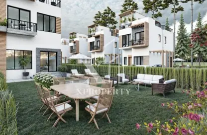 Twin House - 4 Bedrooms - 3 Bathrooms for sale in Hood 10 Side St. - Green Belt - 6 October City - Giza