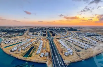 Twin House - 4 Bedrooms - 4 Bathrooms for sale in Mazarine - New Alamein City - Al Alamein - North Coast