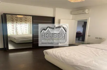 Apartment - 2 Bedrooms - 1 Bathroom for rent in The Village - South Investors Area - New Cairo City - Cairo
