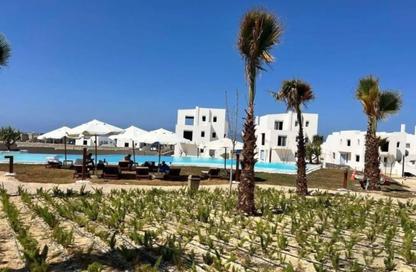 Chalet - 2 Bedrooms - 2 Bathrooms for sale in Jefaira - Ras Al Hekma - North Coast