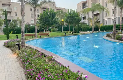 Apartment - 2 Bedrooms - 2 Bathrooms for sale in October Plaza - 6 October Compounds - 6 October City - Giza