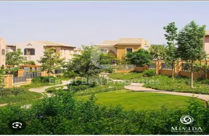 Villa - 5 Bedrooms - 4 Bathrooms for sale in Mivida - 5th Settlement Compounds - The 5th Settlement - New Cairo City - Cairo
