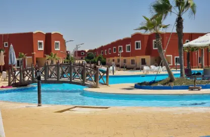 Chalet - 2 Bedrooms - 2 Bathrooms for sale in Bungalows North Coast - Bungalows - Markaz Al Hamam - North Coast