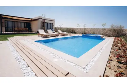 Chalet - 4 Bedrooms - 4 Bathrooms for sale in Beit Al Bahr - Sidi Heneish - North Coast