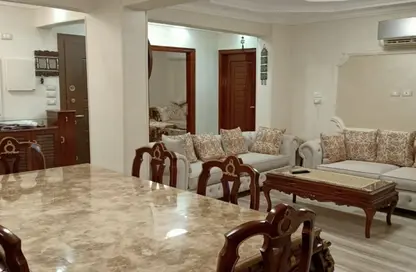 Apartment - 4 Bedrooms - 2 Bathrooms for sale in Abu Hayyan Al Tawhidi St. - Al Hadiqah Al Dawliyah - 7th District - Nasr City - Cairo