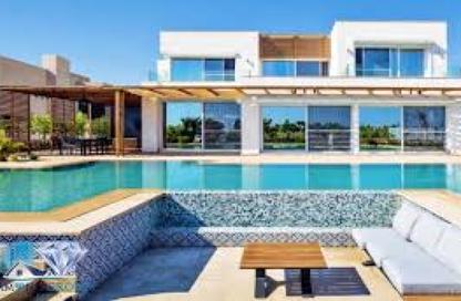 Chalet - 2 Bedrooms - 2 Bathrooms for sale in Hacienda Waters - Qesm Ad Dabaah - North Coast
