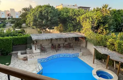 Villa - 6 Bedrooms - 6 Bathrooms for sale in Mena Garden City - Al Motamayez District - 6 October City - Giza