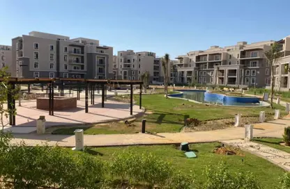Apartment - 2 Bedrooms - 2 Bathrooms for sale in October Plaza - 6 October Compounds - 6 October City - Giza