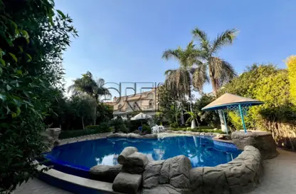 Villa - 5 Bedrooms - 7 Bathrooms for sale in Rawda - Al Wahat Road - 6 October City - Giza