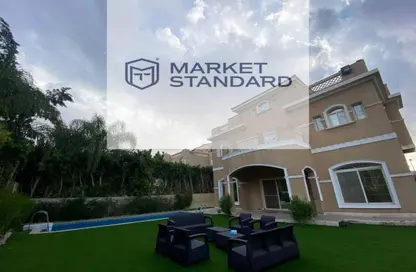 Villa - 6 Bedrooms - 5 Bathrooms for sale in Mena Garden City - Al Motamayez District - 6 October City - Giza