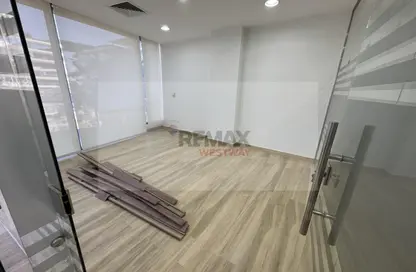 Office Space - Studio - 1 Bathroom for rent in Arkan Plaza - 26th of July Corridor - Sheikh Zayed City - Giza