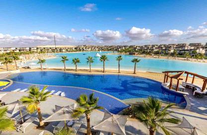 Chalet - 2 Bedrooms - 2 Bathrooms for sale in Swan Lake North Coast - Qesm Ad Dabaah - North Coast