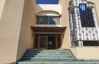 Villa - 6 Bedrooms - 5 Bathrooms for sale in Mena Garden City - Al Motamayez District - 6 October City - Giza