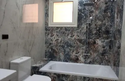 Apartment - 4 Bedrooms - 3 Bathrooms for rent in West Somid Road - West Somid - 6 October City - Giza