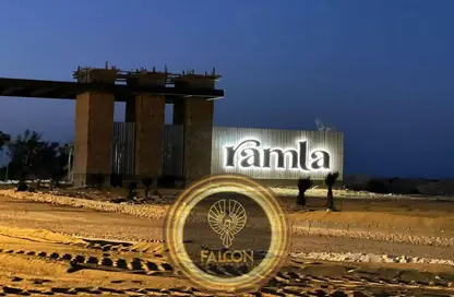 Chalet - 2 Bedrooms - 2 Bathrooms for sale in Ramla Lakeside - Qesm Ad Dabaah - North Coast