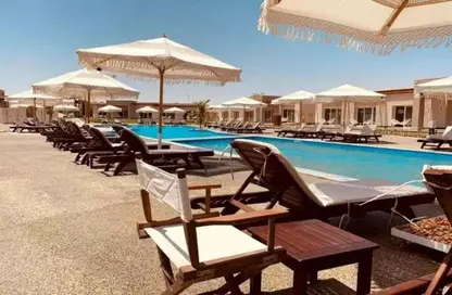 Duplex - 2 Bedrooms - 2 Bathrooms for sale in Gaia - Ras Al Hekma - North Coast