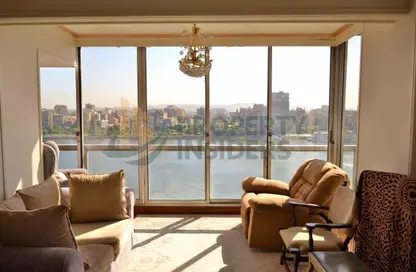 Apartment - 3 Bedrooms - 3 Bathrooms for sale in Nile St. - Dokki - Giza